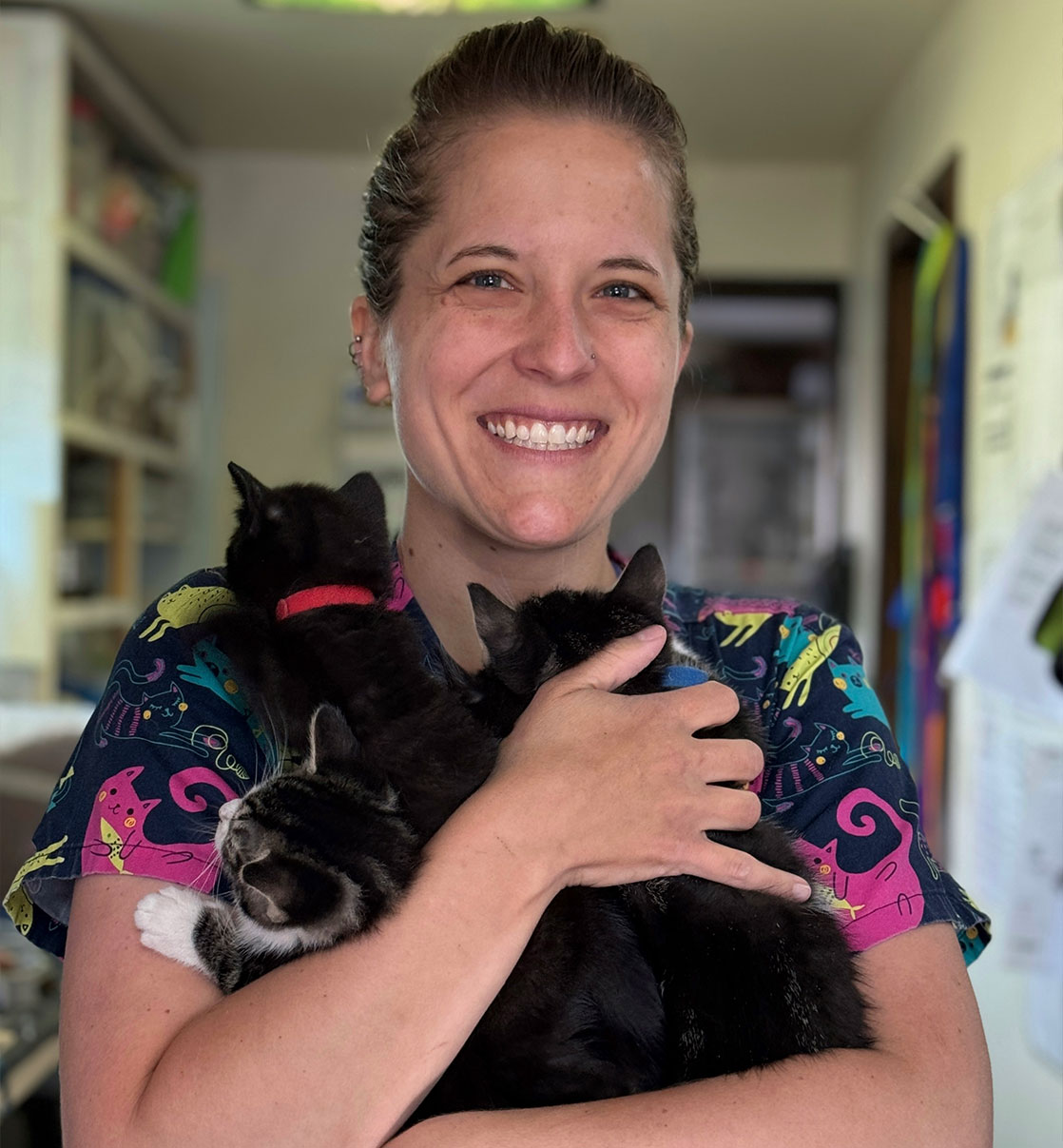 women holding the pet